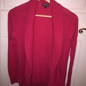 Woman’s pink cardigan